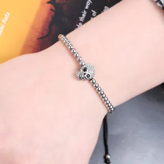 朋克风男士手链 黑绳编织圆珠骷髅头镶钻饰品 镀白K可调节潮流嘻哈手绳