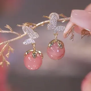 粉色镶钻珍珠蝴蝶眼石耳坠耳钉耳环