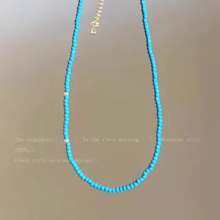 蓝色小米珠转金筒项链